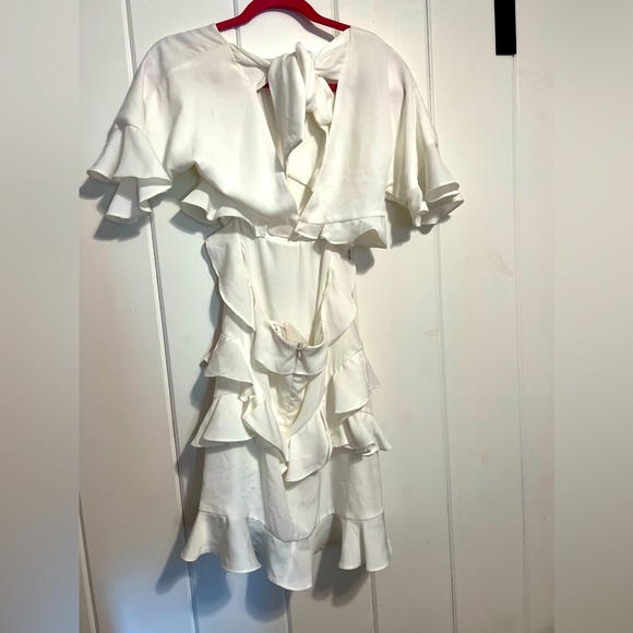 Dresses & Skirts - Brand New never worn beautiful dress with open area on back